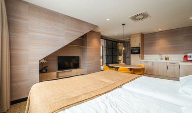 Komfort-Deluxe-Familien-Dachzimmer mit Küche Komfort-Deluxe-Familien-Dachzimmer mit Küche